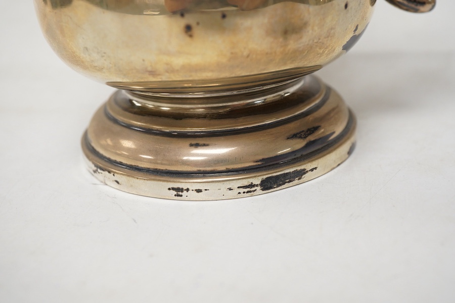 A George V silver mug by Walker & Hall, Sheffield, 1921, on a circular foot, height 12.5cm, 9.5oz.